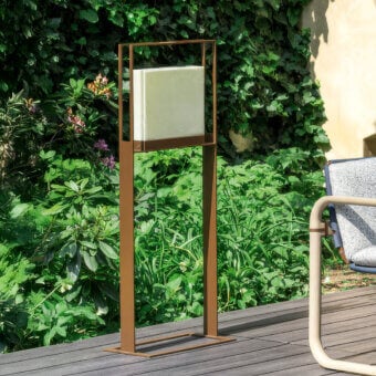 Distinguished Giorgetti Gea floor lamp with carob painted steel frame and sophisticated onyx diffuser emitting a warm glow