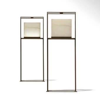 Distinguished Giorgetti Gea floor lamp with a carob painted steel frame and sophisticated onyx diffuser emitting a warm glow