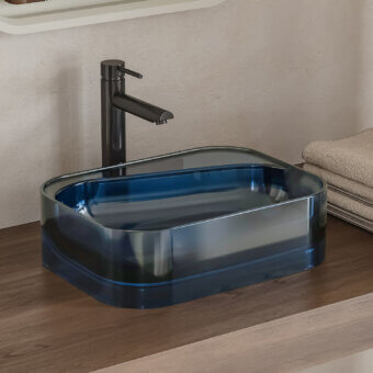 Exceptional Norah Design ANBA 01 washbasin crafted in Norahcrystal with a glossy deep teal blue finish