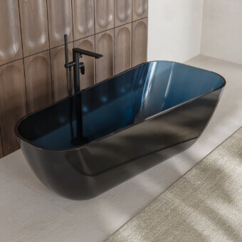 Distinguished Norah Design ANBT 01 bathtub crafted in blue-gray Norahcrystal with a smooth matte finish delivers a luminous bathing experience