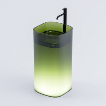 Architectural Norah Design CUCN 02 washbasin crafted in translucent Norahcrystal with an olive green to luminous yellow-green gradient and glossy finish