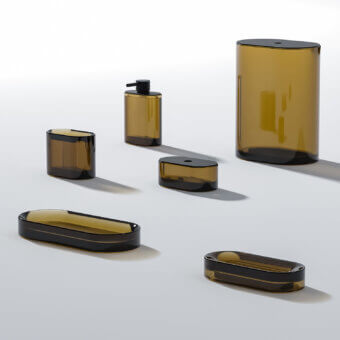 Architectural Norah Design Lisbona bathroom set crafted in luminous Norahcrystal with a glossy warm amber tone and matte black base