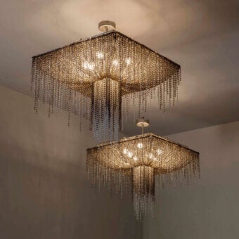 Lavish Patrizia Garganti Burlesque EX square ceiling lamp crafted in warm gold-toned metal with cascading pearl strands