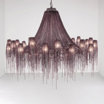 Distinguished Patrizia Garganti Burlesque chandelier crafted with matte plum metal and cascading glass-like elements in curved baroque lines