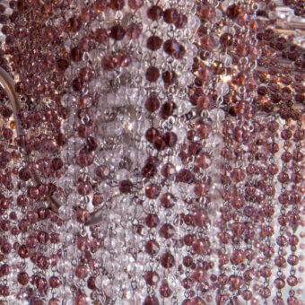 Lavish Patrizia Garganti Burlesque Crystal Cascade wall lamp crafted in mauve and rose-toned faceted crystal elements
