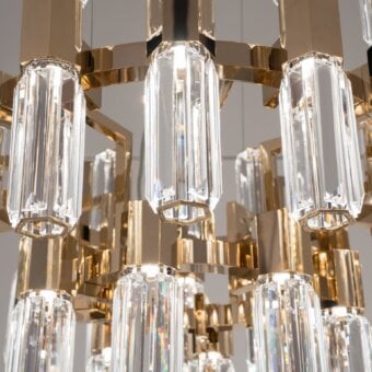 Distinguished Patrizia Garganti Chaos Orb chandelier crafted in metal with glossy golden finish and clear glass