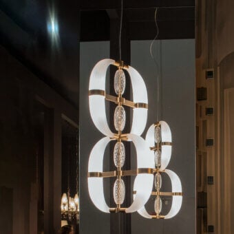 Elegant Patrizia Garganti Coup De Foudre 03 suspension lamp with cascading hand-blown glass and polished metal structure crafted in Italy