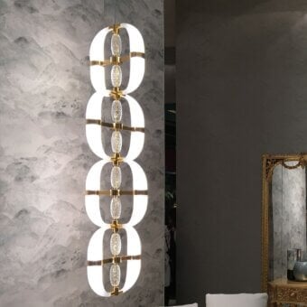 Lavish Patrizia Garganti Coup De Foudre 04 suspension lamp in hand-blown glass with polished metal and warm gold cascading shapes