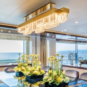 Superior Patrizia Garganti Gisele with Rods suspension lamp crafted in metal with glossy golden finish and integrated illumination
