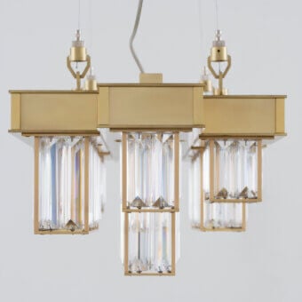 Elegant Patrizia Garganti Gisele suspension lamp in geometric design with warm gold-finished laser-cut steel and clear glass prisms