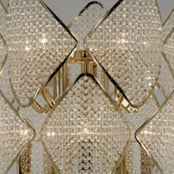 Lavish Patrizia Garganti Holly chandelier with rhombus modules and lustrous golden-toned metal built in Italy with glossy finish