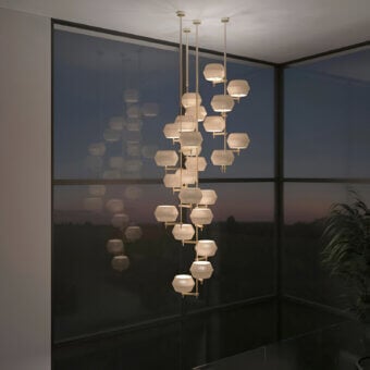 Harmonious Patrizia Garganti Novecento EX01 chandelier with twenty-four light sources and soft milky white sculptural shades in satin gold-toned metal