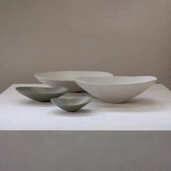 Exceptional Rina Menardi Baccelli centerpiece crafted in baked clay with organically curved profiles and a smooth matte finish