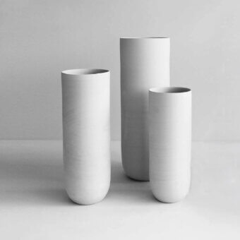 Elegant Rina Menardi Canne vase set crafted from baked clay in off-white and pale beige tones with a smooth matte finish