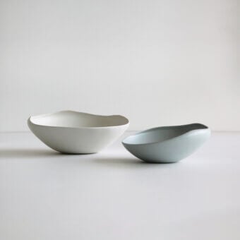 Exclusive Rina Menardi Conchiglie centerpiece crafted from baked clay in grayish-blue with a smooth matte finish