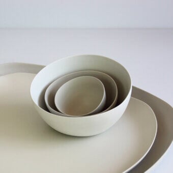 Exceptional Rina Menardi Nidi vase crafted in ceramic with gently curved forms and smooth matte beige finish