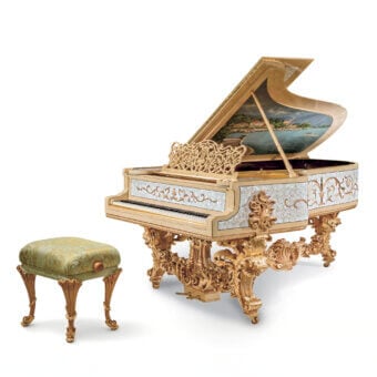 Distinguished Riva Mobili D'Arte 19800 piano crafted in creamy off-white with gilded accents and hand-painted coastal landscape details