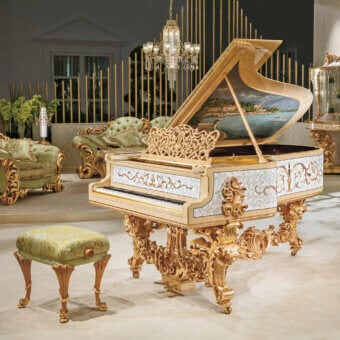 Lavish Riva Mobili D'Arte 19800 piano crafted in creamy off-white with gold detailing and mother-of-pearl inlays