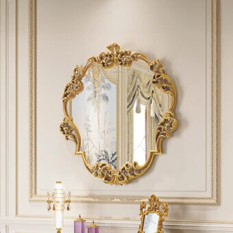 Distinguished Riva Mobili D'Arte 22035 mirror crafted in gold tone with hand-carved floral and foliate motifs and glossy finish