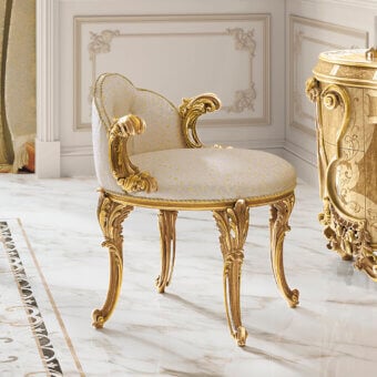 Superior handcrafted chair from the Comacina Collection with gilded wood and subtly patterned cream and gold textile upholstery