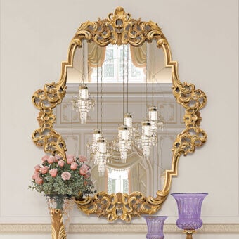 Lavish Riva Mobili D'Arte 22056 mirror crafted in wood with a glossy gold tone and elaborate floral motifs