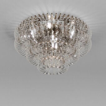 Exceptional Vistosi Ecos ceiling lamp crafted in clear hand-blown Murano glass with polished metal and rigadin texture
