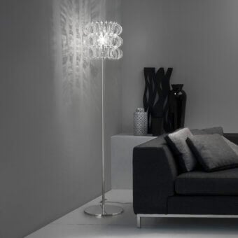 Superior Vistosi Ecos floor lamp built with hand-blown Murano glass and polished metal in a tiered crystalline silhouette