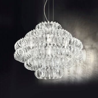 Elegant Vistosi Ecos suspension lamp crafted in clear hand-blown Murano glass with a rigadin texture creating a brilliant shimmer