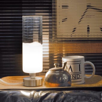Superior Vistosi Lio table lamp with translucent white glass and silver-toned metallic base crafted for ambient glow