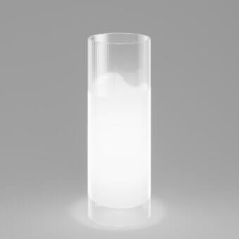 Distinguished Vistosi Lio table lamp crafted in translucent glass with a sleek geometric form emitting a bright diffused white glow