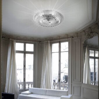 Distinguished Vistosi Novecento ceiling lamp crafted in bright silver with a signature rigadin finish exhibiting a classic radiating pattern
