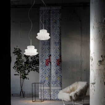 Exceptional Vistosi Novecento suspension lamp crafted in off-white glass with a signature rigadin finish