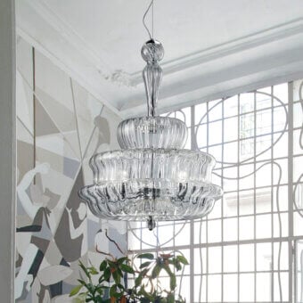 Elegant Vistosi Novecento suspension lamp crafted in clear glass with a signature rigadin finish and ornate form