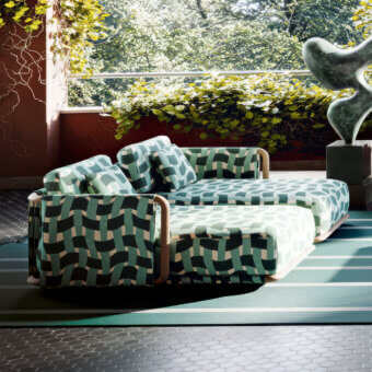 Exceptional Giorgetti Moorea chaise lounge crafted with pewter-painted stainless steel and teak, upholstered in patterned green textile