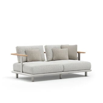 Elegant Atmosphera Bliss sofa with textured light neutral gray textile and natural teak armrest in Gesso finish