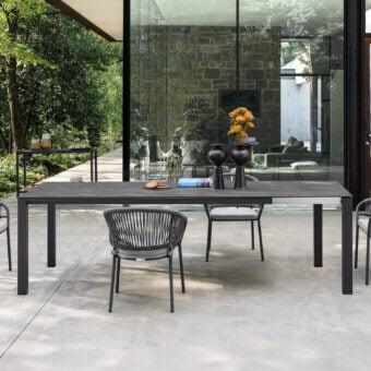 Superior Atmosphera Bridge extendable table with stoneware top and aluminum base boasts a neutral gray and brown textured matte finish