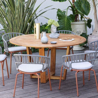 Distinguished Atmosphera Desert table crafted from Asian TEAK wood with a warm medium-brown hue and oil finish