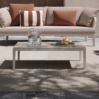 Sophisticated Atmosphera Dream coffee table crafted with epoxy painted aluminum and tempered glass exhibiting a painted stone effect finish