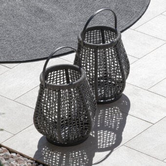 Distinguished Atmosphera Ludo candle floor lamp with a dark gray water-resistant knitted textilene exterior and contemporary curved silhouette