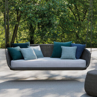 Exceptional Atmosphera Ludo hanging sofa with dark gray-brown frame and teal, navy, light gray-blue cushions, woven with textured finish