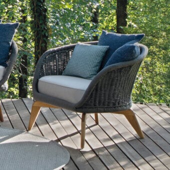 Exceptional Atmosphera Ludo lounge chair with robust teak wood frame and hand-woven gray rope backrest accented with dark blue cushions