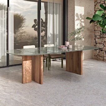 Distinguished Atmosphera Materia table crafted with Asian Teak and textured glass in a satin finish
