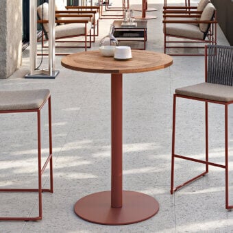 Distinguished Atmosphera Net B table crafted with teak wood and reddish-brown powder-coated galvanized steel pedestal