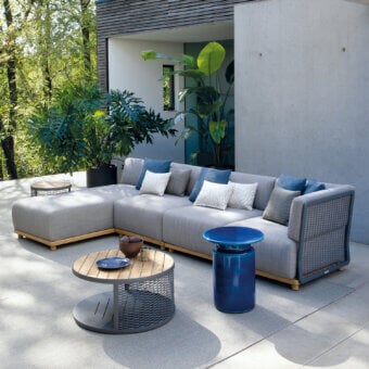 Architectural Atmosphera Switch sectional with light gray woven fabric and satin-finish wood frame