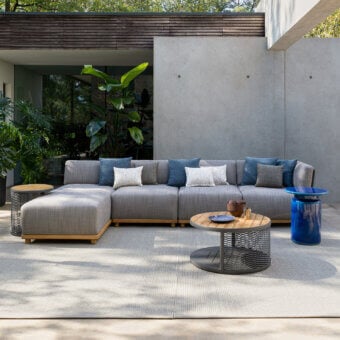 Distinguished Atmosphera Switch sectional with textured neutral gray textile and subtly contrasting wooden frame