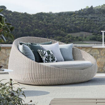 Exceptional Atmosphera Twiga daybed with hand-woven synthetic rattan and durable epoxy-painted aluminum frame in neutral beige tones