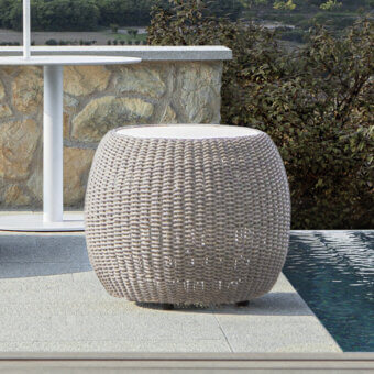 Distinguished Atmosphera Twiga side table with light gray hand-woven synthetic rattan and durable fossil stone top