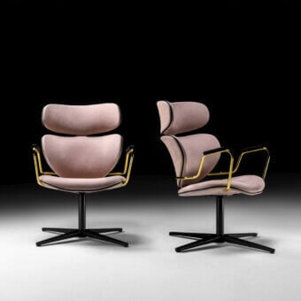 Superior Black Tie Asia swivel lounge chair upholstered in muted rose textile with a sleek golden metal frame and dark metal base