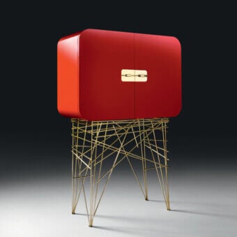 Exceptional Black Tie Mai Tai bar cabinet crafted with curved plywood and lacquered MDF in vibrant red with gold-toned metal support