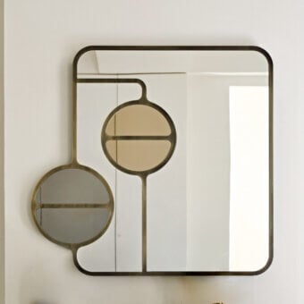 Distinguished Black Tie Mou mirror crafted in Italy with dark bronze metal and nuanced colored glass